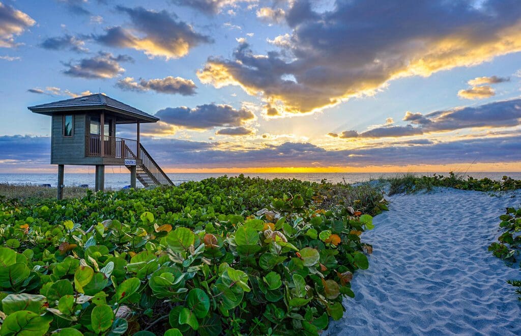Beach path to lifeguard hut at sunrise
